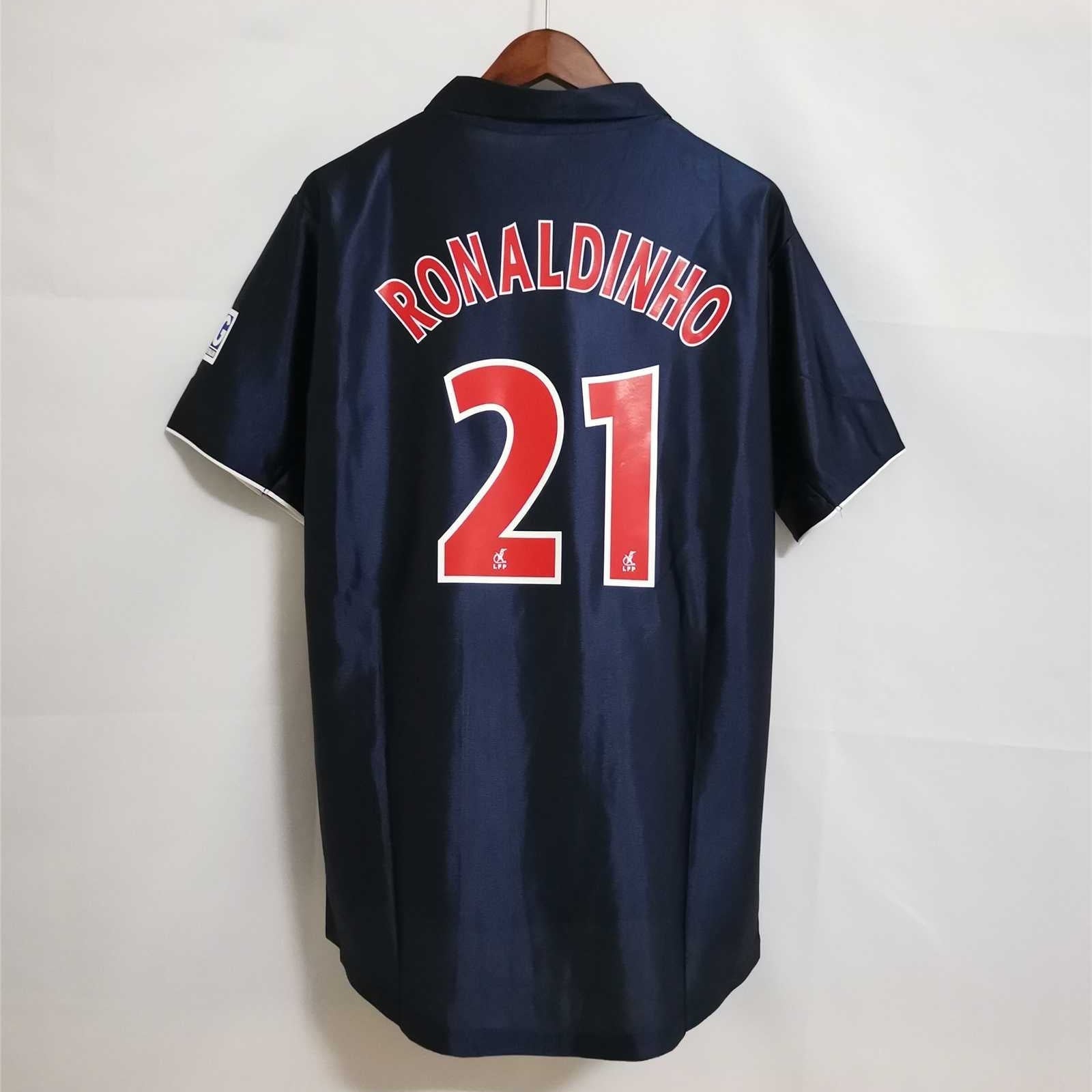 Maglia_PSG_2001_02_Ronaldinho_numero_21_retro_blu_con_nome_stampato_c6329945-c807-451e-bac0-658bd2e0d7f9.jpg