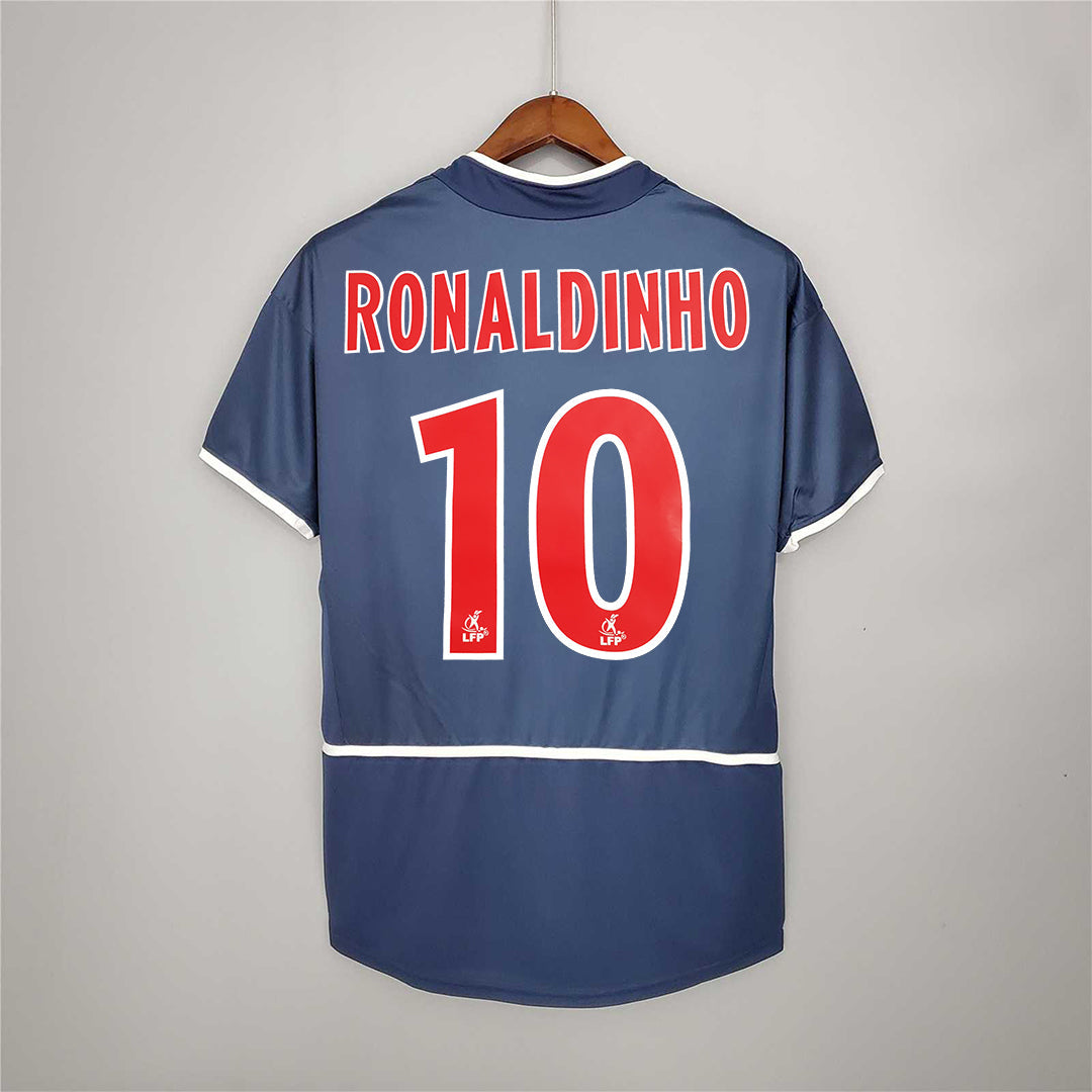 Maglia_PSG_2002_03_Ronaldinho_numero_10_retro_blu_con_nome_stampato_3cf420d1-547e-4e05-b669-58e795ba89bc.jpg
