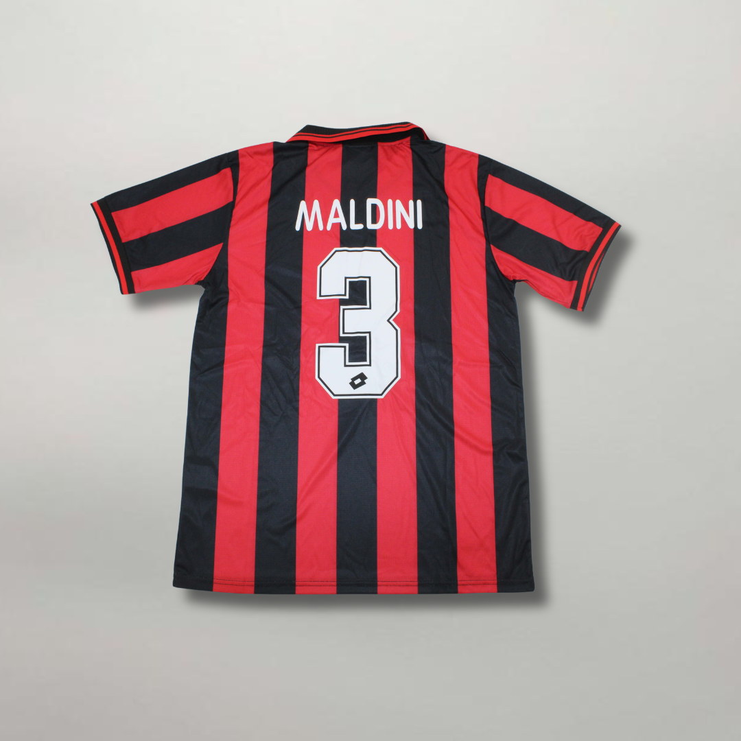 Retro_maglia_Milan_1997_98_stile_calcio_italiano_vintage_Maldini.png